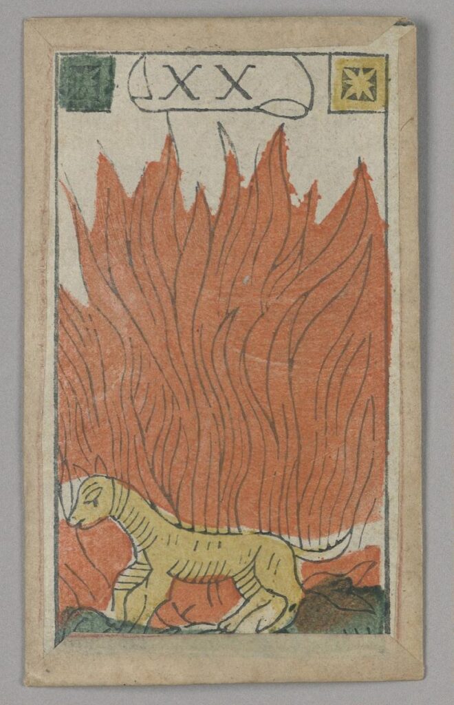 Tarot card with red flame, tan frame, and yellow unidentifiable animal. XX is printed in a banner on the top.